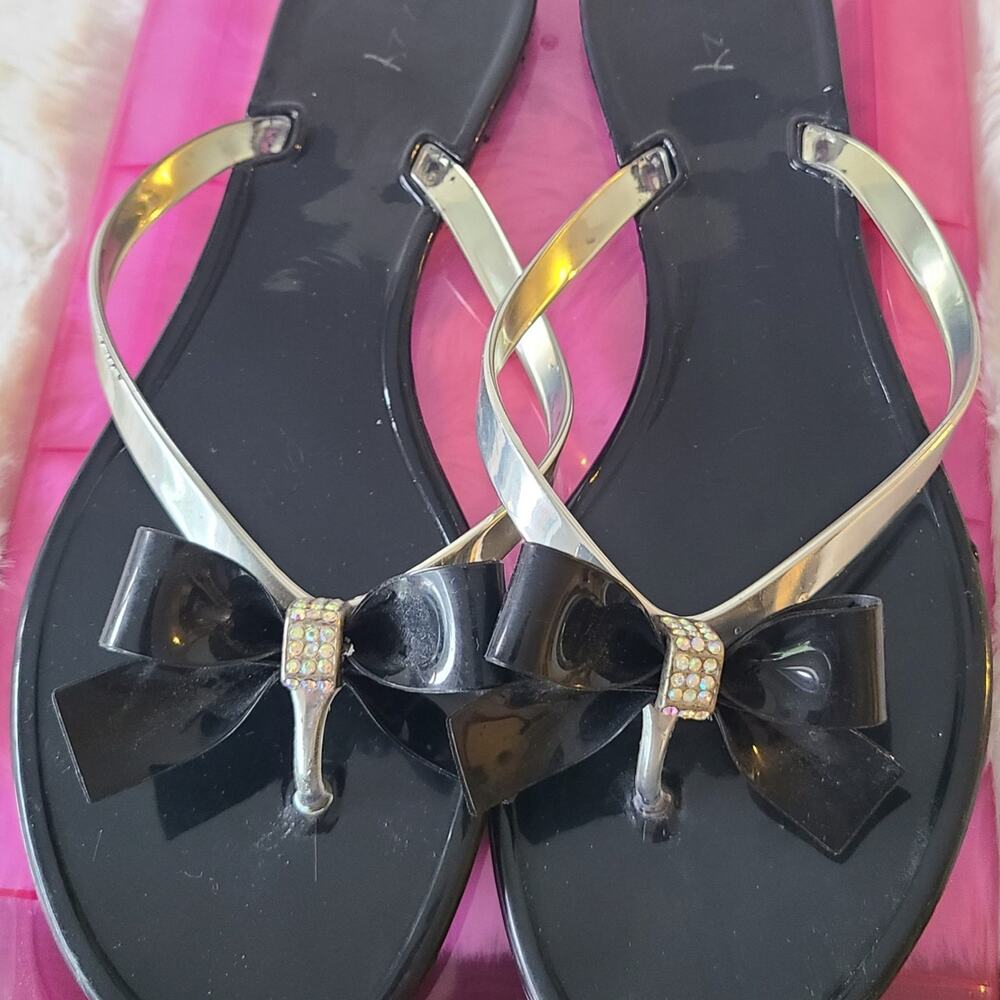 Dizzy Black Rhinestone Bow Jelly Flip Flops